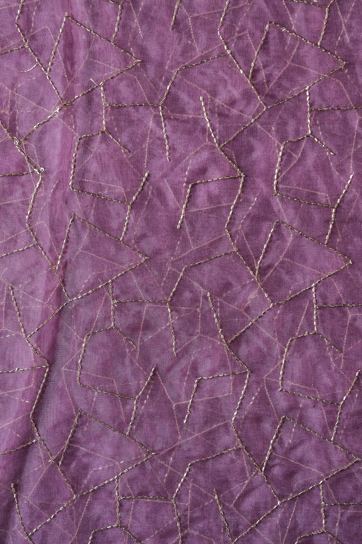 AIzaSyBcstauz-XMPRhEY21AUzeo032pxrXB5Ug - Cut Dana Beads Appealing Abstract Embroidery On Lavender Organza Fabric