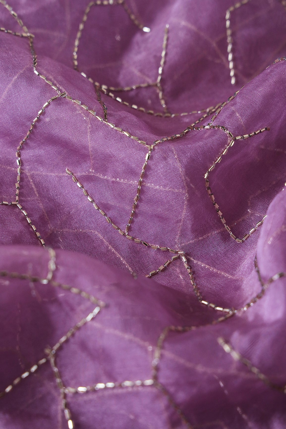 AIzaSyBcstauz-XMPRhEY21AUzeo032pxrXB5Ug - Cut Dana Beads Appealing Abstract Embroidery On Lavender Organza Fabric