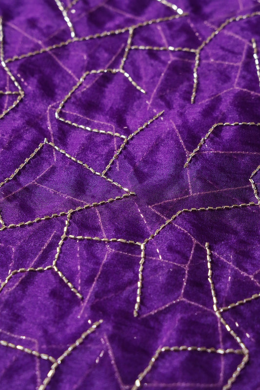 AIzaSyBcstauz-XMPRhEY21AUzeo032pxrXB5Ug - Cut Dana Beads Appealing Abstract Embroidery On Purple Organza Fabric
