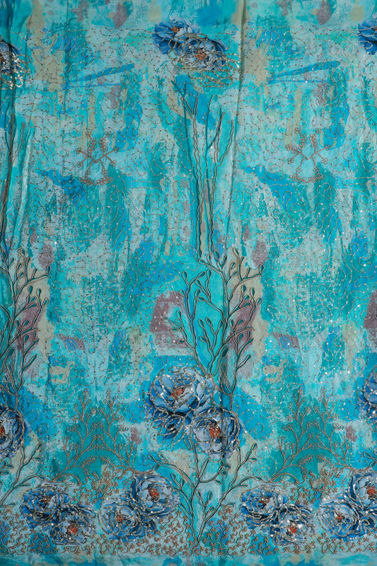 AIzaSyBcstauz-XMPRhEY21AUzeo032pxrXB5Ug - Floral Positional Print On Sequins With Zari Embroidery Work On Turquoise Blue Pure Crepe Fabric