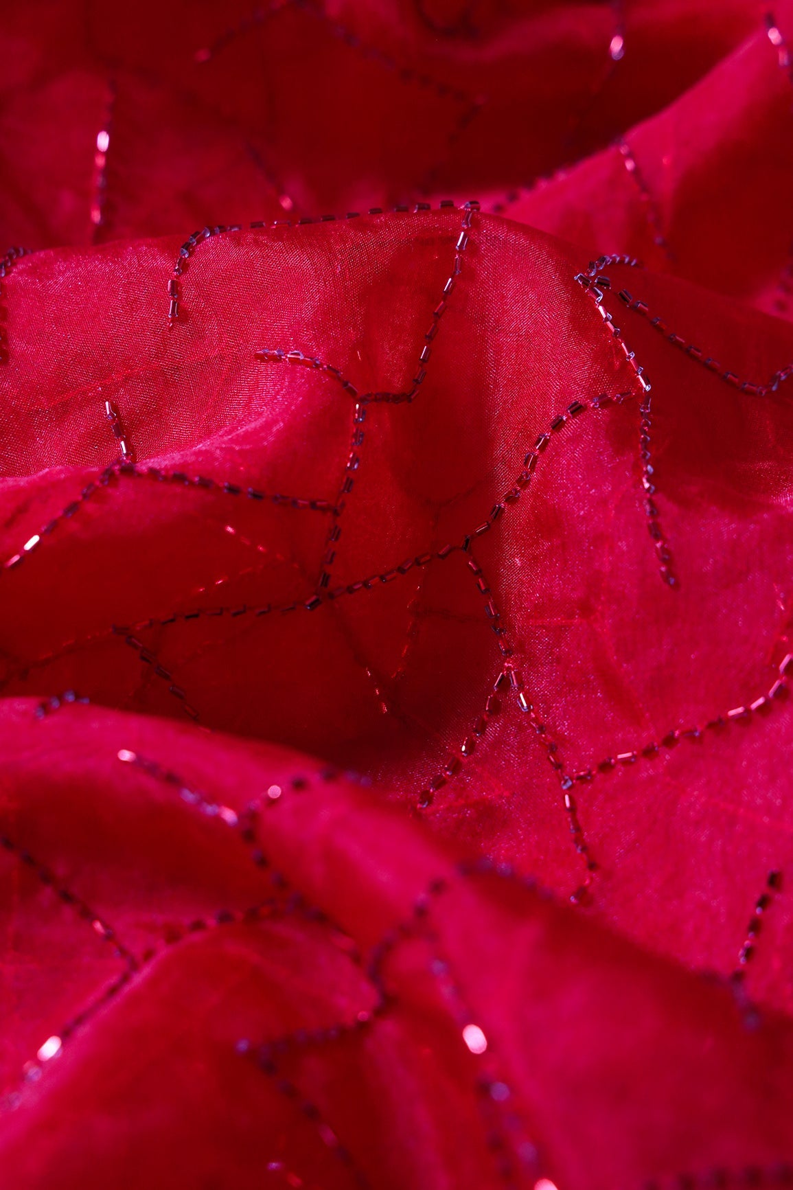 AIzaSyBcstauz-XMPRhEY21AUzeo032pxrXB5Ug - Cut Dana Beads Appealing Abstract Embroidery On Red Organza Fabric