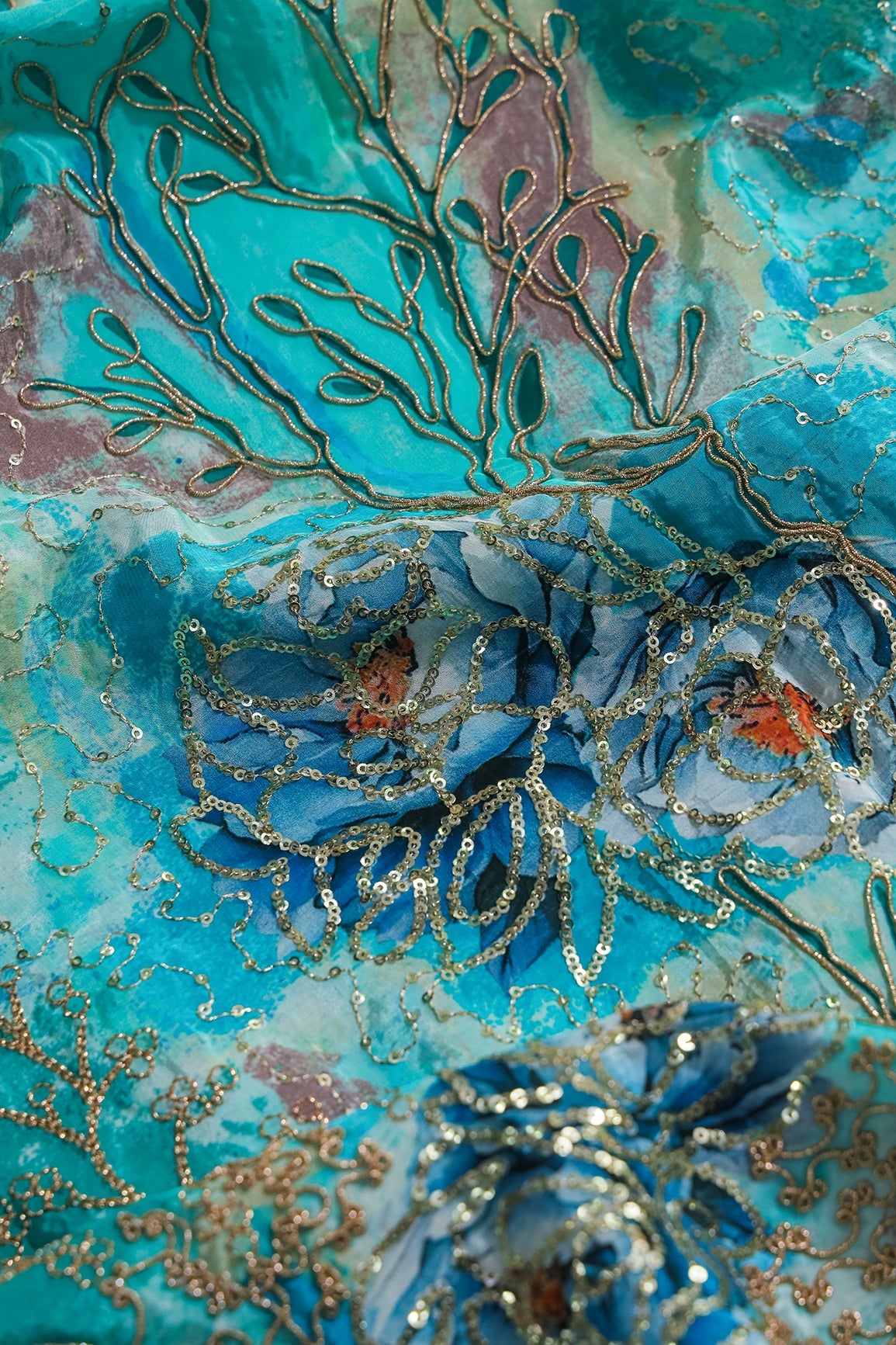 AIzaSyBcstauz-XMPRhEY21AUzeo032pxrXB5Ug - Floral Positional Print On Sequins With Zari Embroidery Work On Turquoise Blue Pure Crepe Fabric