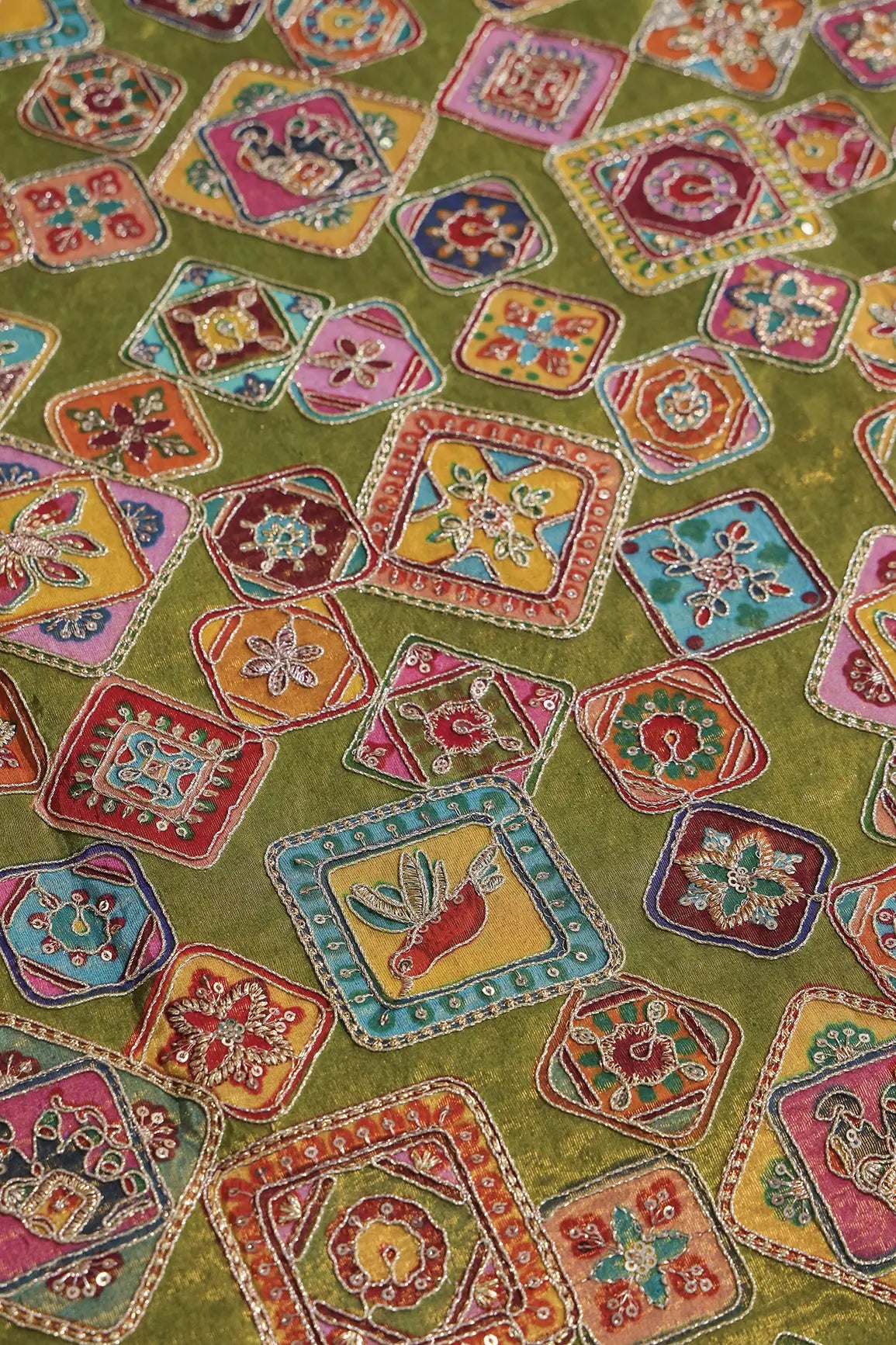 AIzaSyBcstauz-XMPRhEY21AUzeo032pxrXB5Ug - Gold Zari With Sequins Traditional Positional Print On Green Pure Viscose Zari Tissue Fabric