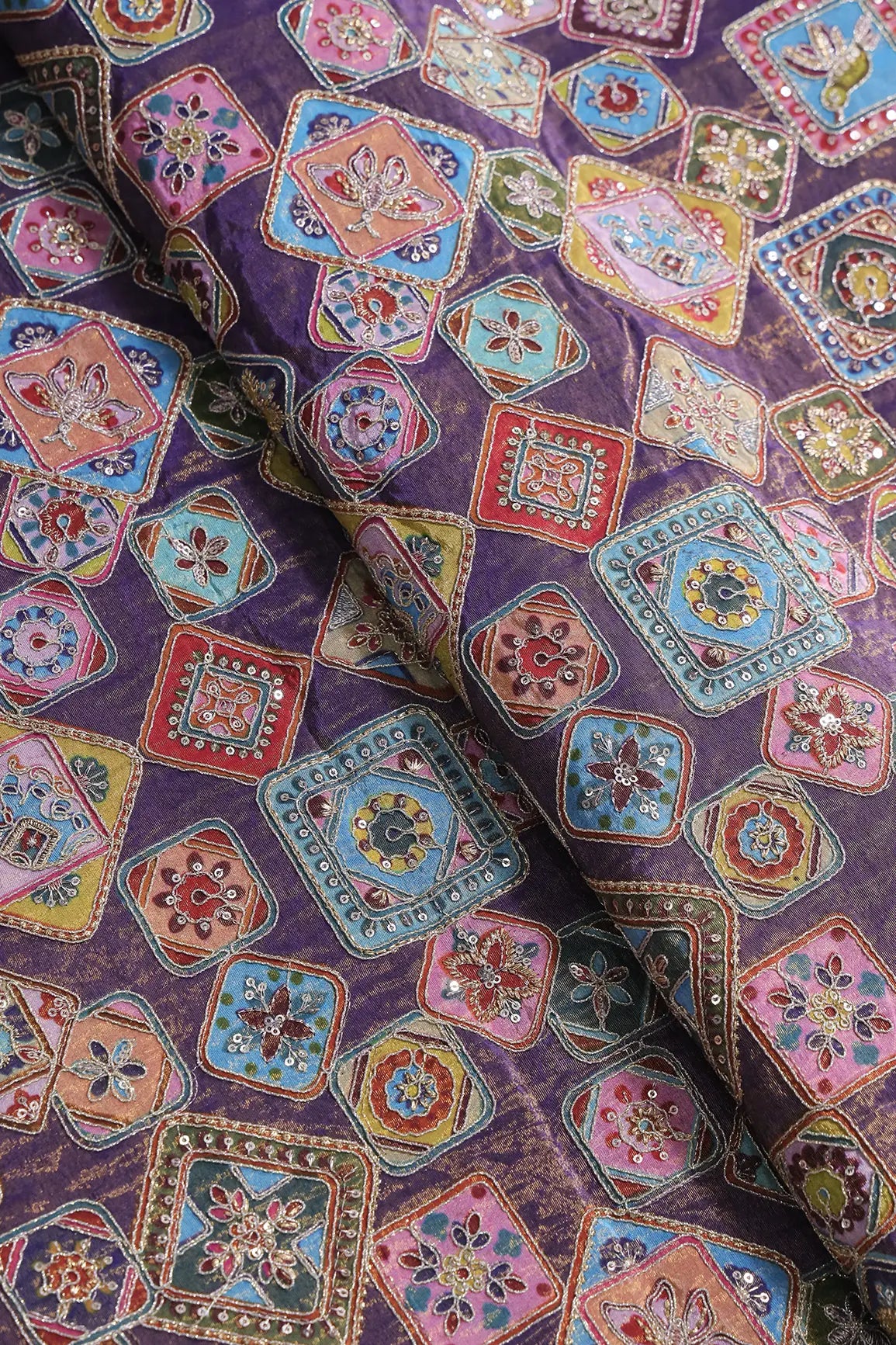 AIzaSyBcstauz-XMPRhEY21AUzeo032pxrXB5Ug - Gold Zari With Sequins Traditional Positional Print On Purple Pure Viscose Zari Tissue Fabric