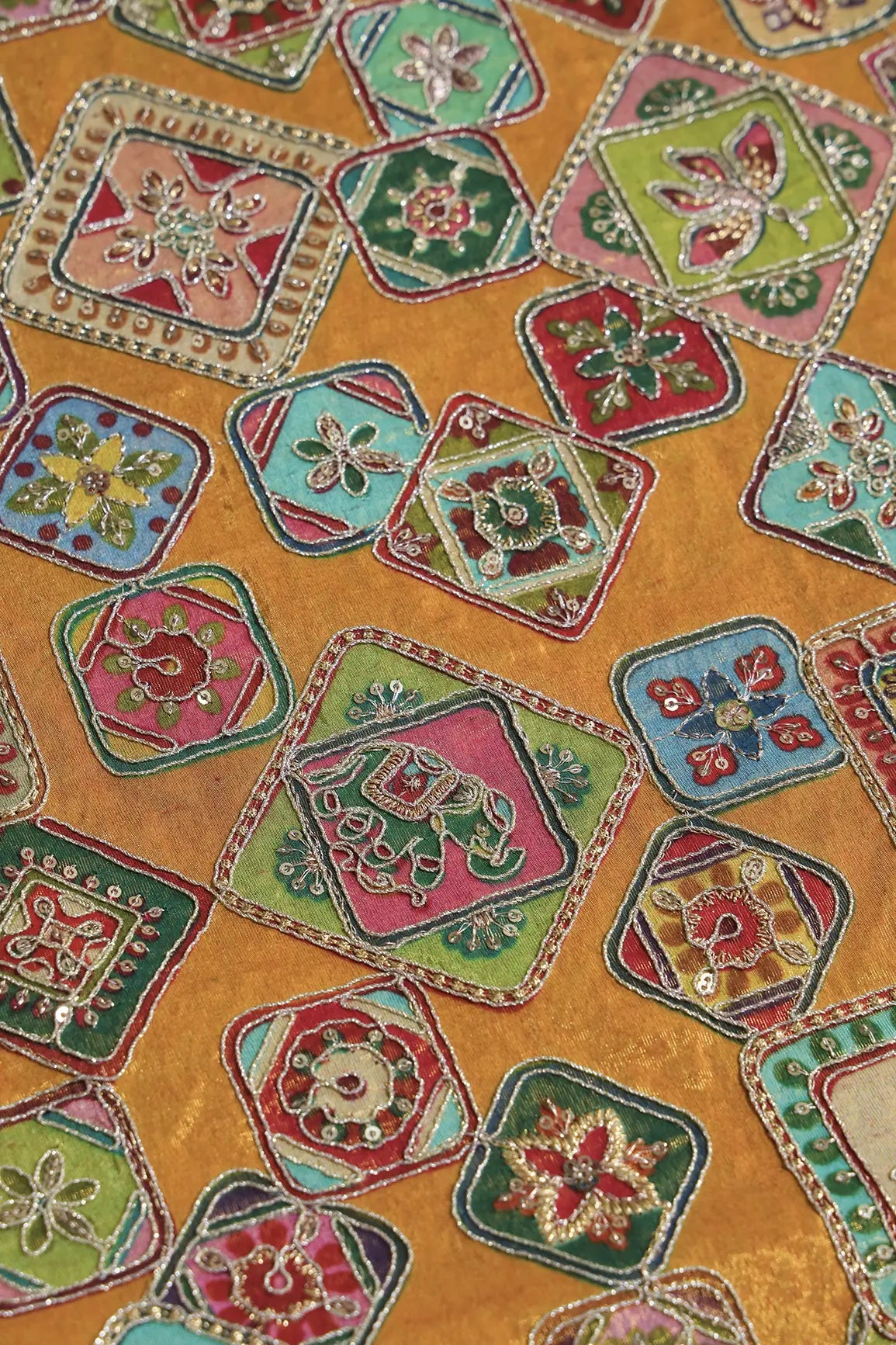 AIzaSyBcstauz-XMPRhEY21AUzeo032pxrXB5Ug - Gold Zari With Sequins Traditional Positional Print On Mustard Yellow Pure Viscose Zari Tissue Fabric