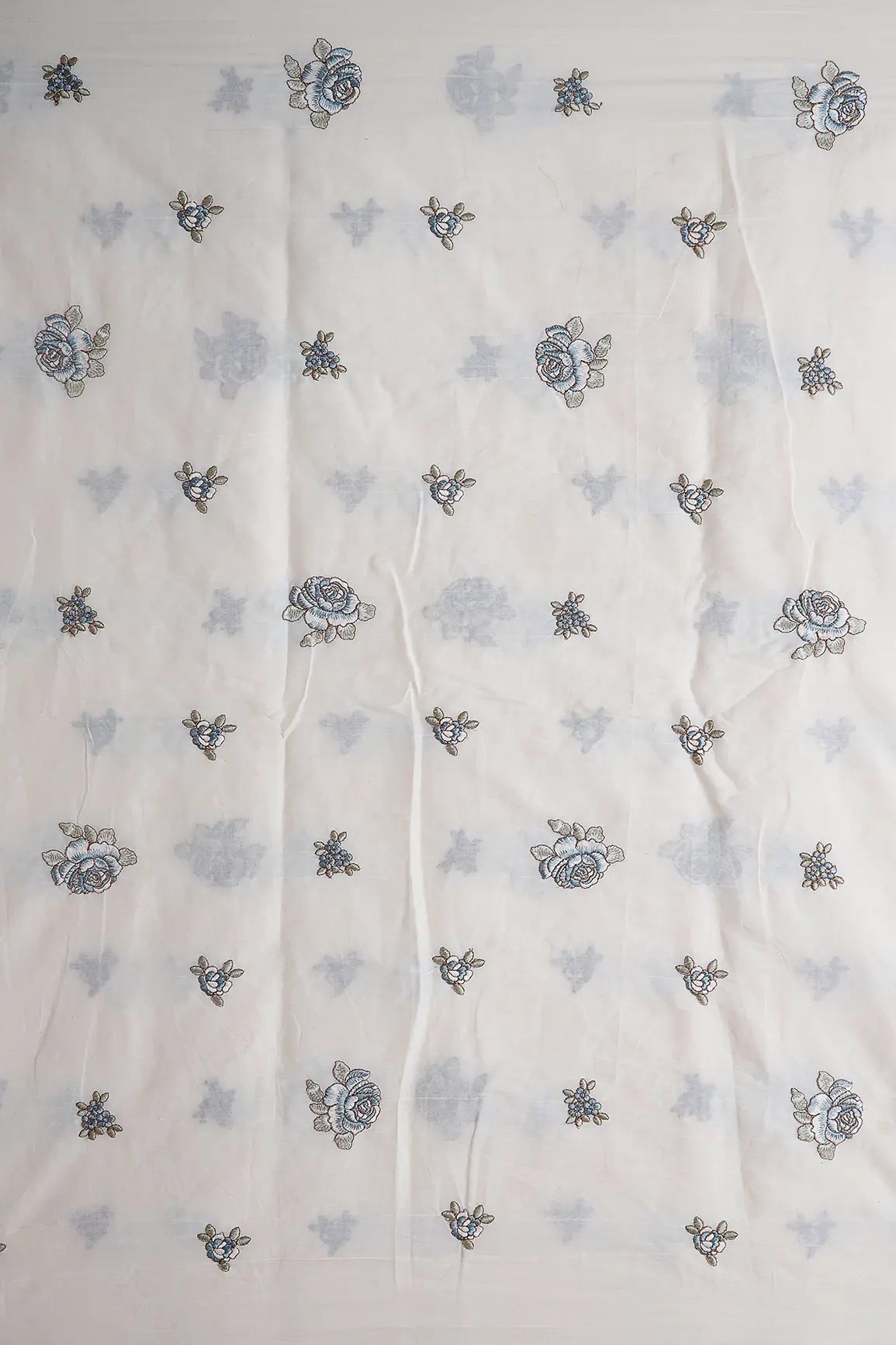 AIzaSyBcstauz-XMPRhEY21AUzeo032pxrXB5Ug - Blue And Olive Thread Floral Embroidery On Off White Organic Cotton Fabric