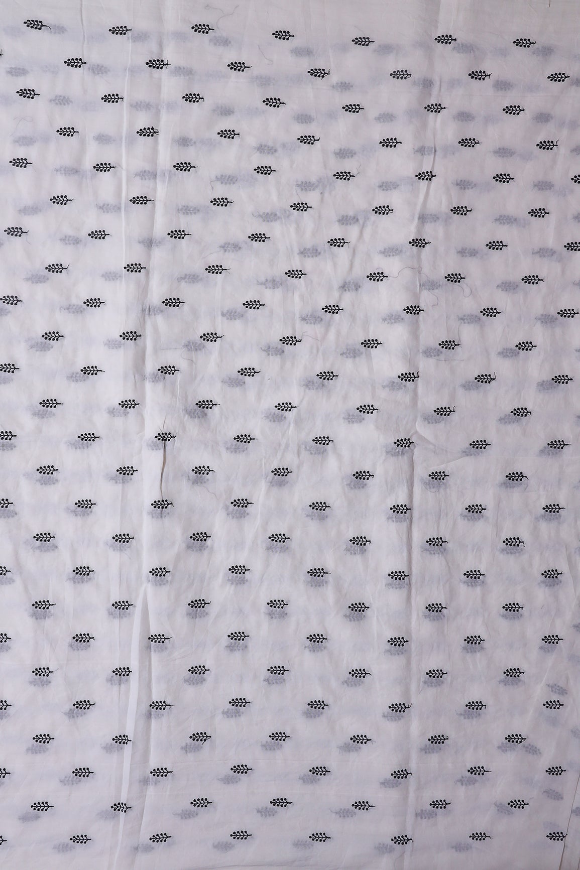 AIzaSyBcstauz-XMPRhEY21AUzeo032pxrXB5Ug - Black Thread Leafy Embroidery On White Pure Mul Cotton Fabric