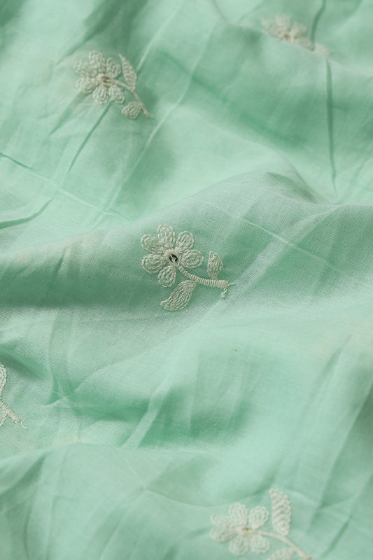 White Thread Small Floral Embroidery On Sea Green Pure Mul Cotton Fabric