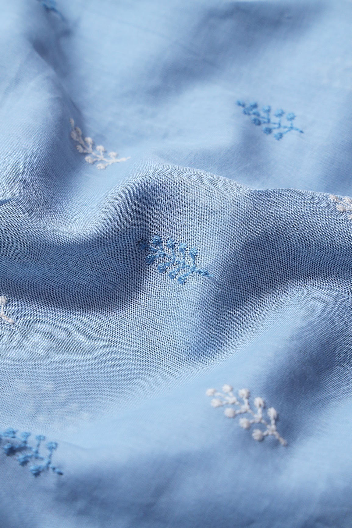 AIzaSyBcstauz-XMPRhEY21AUzeo032pxrXB5Ug - Blue And White Thread Leafy Embroidery On Pastel Blue Pure Mul Cotton Fabric