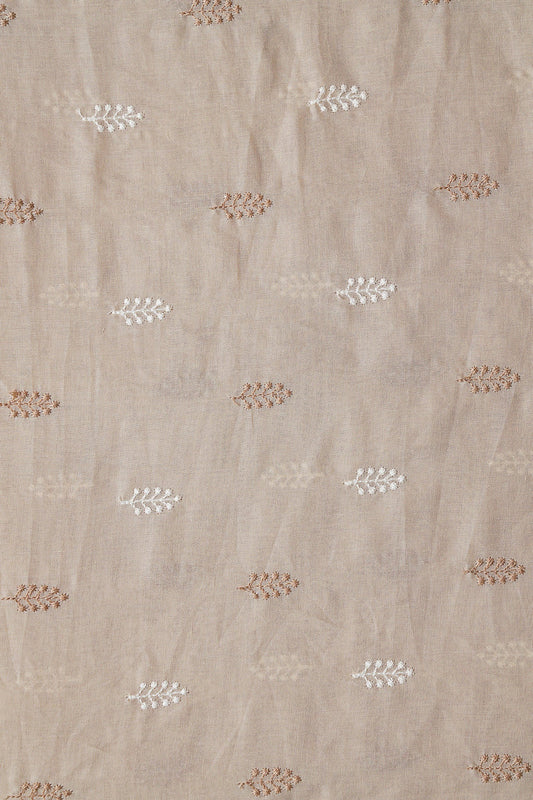 AIzaSyBcstauz-XMPRhEY21AUzeo032pxrXB5Ug - Beige And White Thread Leafy Embroidery On Beige Pure Mul Cotton Fabric