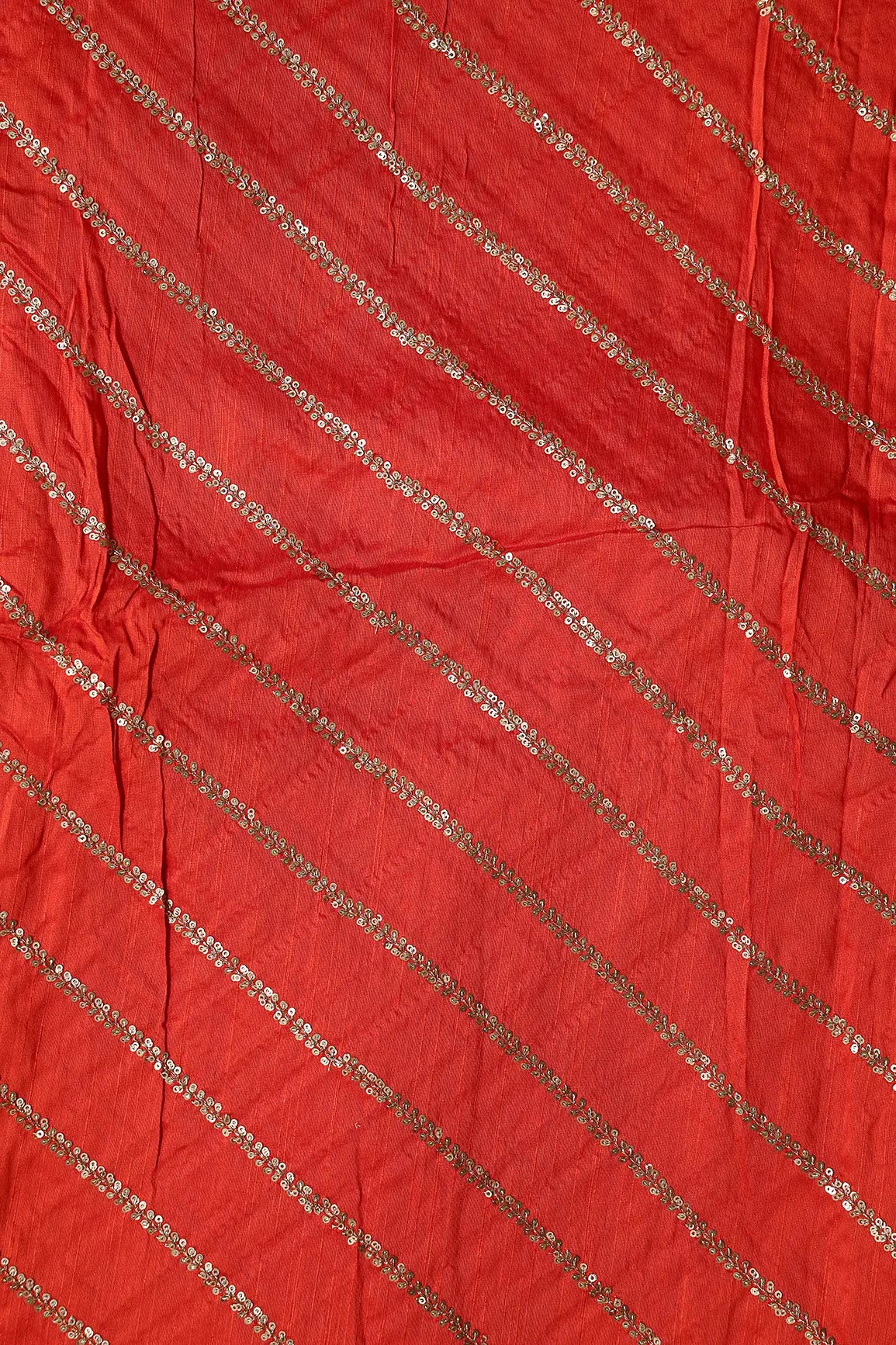 AIzaSyBcstauz-XMPRhEY21AUzeo032pxrXB5Ug - Gold Sequins With Gold Zari Stripes Embroidery Work On Dark Orange Raw Silk Fabric