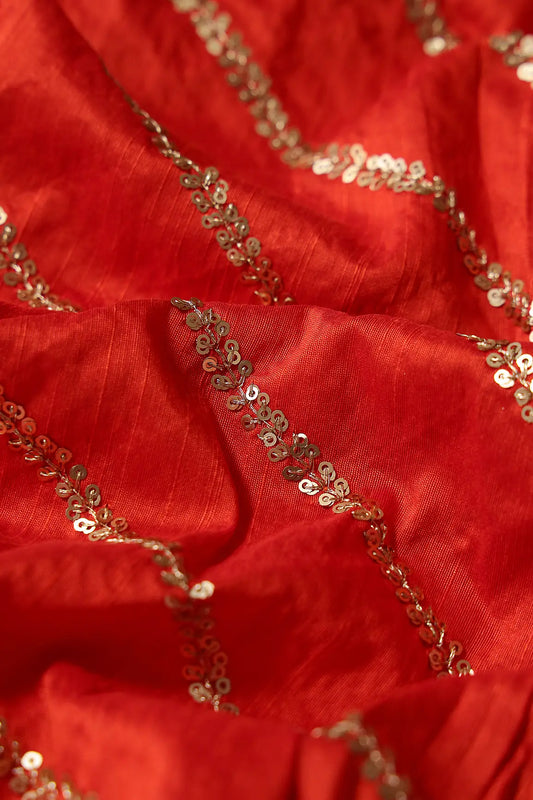 AIzaSyBcstauz-XMPRhEY21AUzeo032pxrXB5Ug - Gold Sequins With Gold Zari Stripes Embroidery Work On Dark Orange Raw Silk Fabric