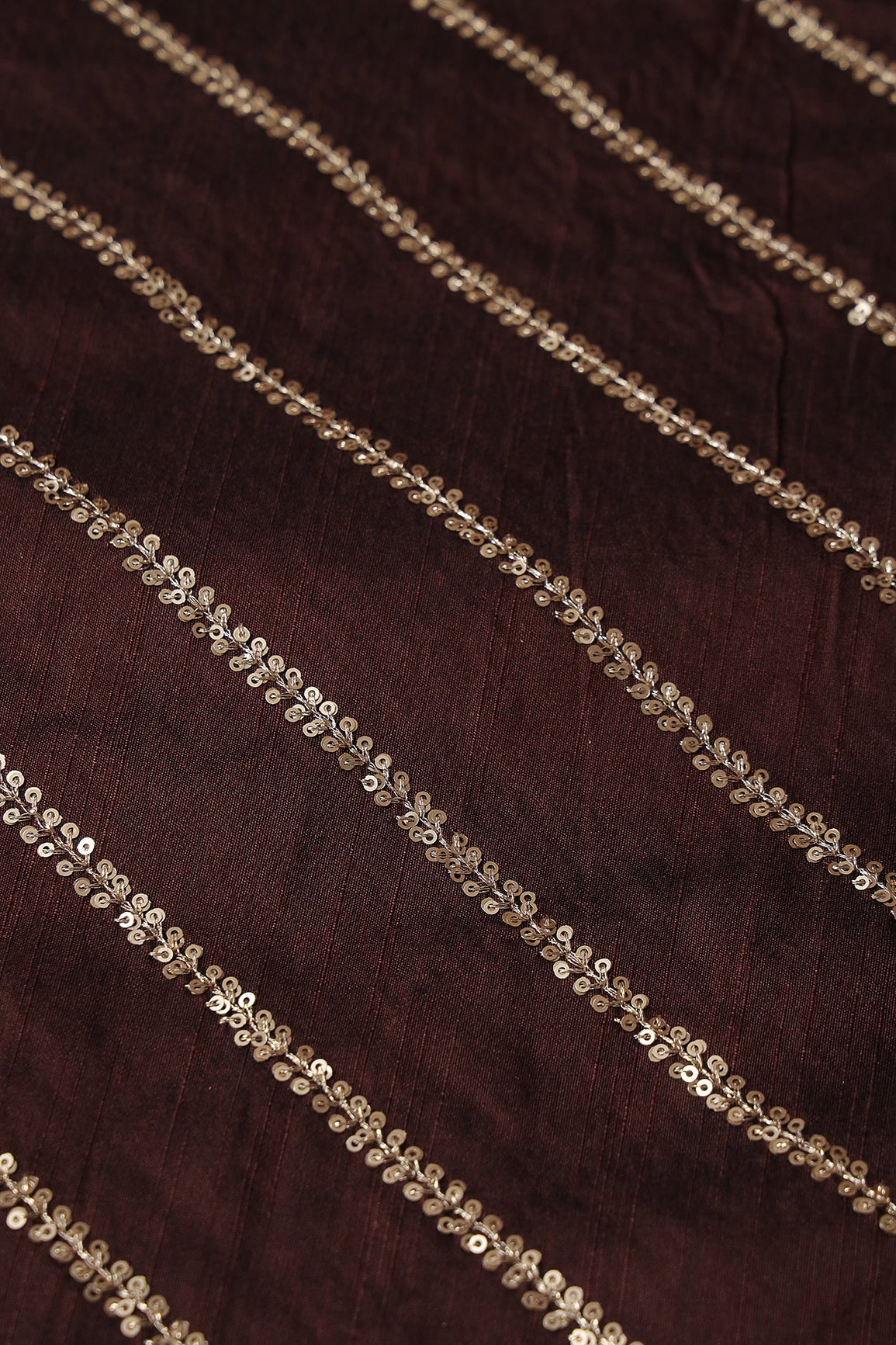 AIzaSyBcstauz-XMPRhEY21AUzeo032pxrXB5Ug - Gold Sequins With Gold Zari Stripes Embroidery Work On Brown Raw Silk Fabric