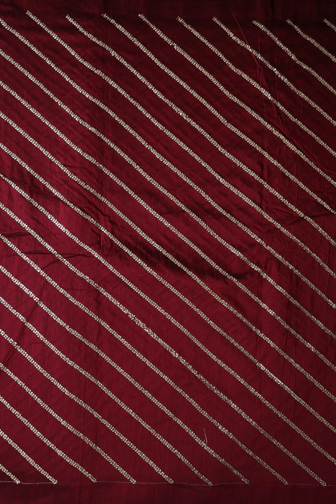 AIzaSyBcstauz-XMPRhEY21AUzeo032pxrXB5Ug - Gold Sequins With Gold Zari Stripes Embroidery Work On Dark Maroon Raw Silk Fabric