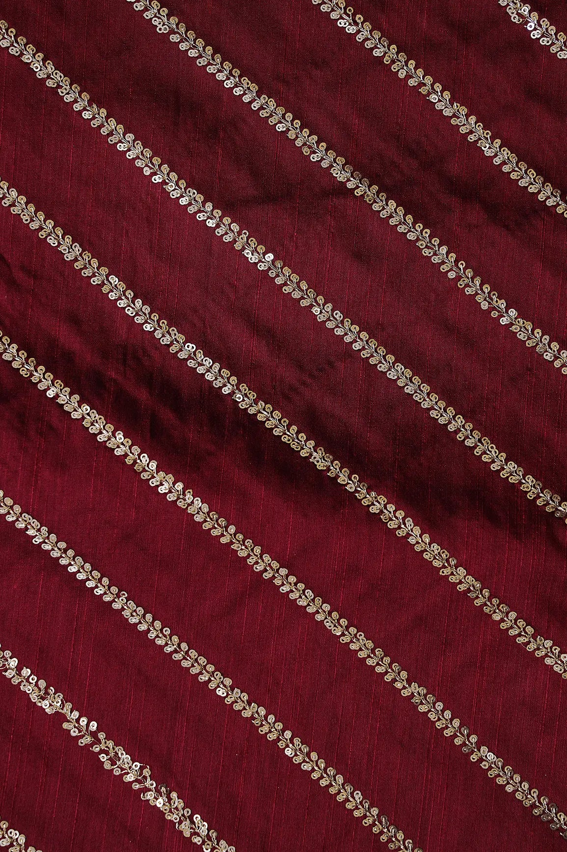 AIzaSyBcstauz-XMPRhEY21AUzeo032pxrXB5Ug - Gold Sequins With Gold Zari Stripes Embroidery Work On Dark Maroon Raw Silk Fabric