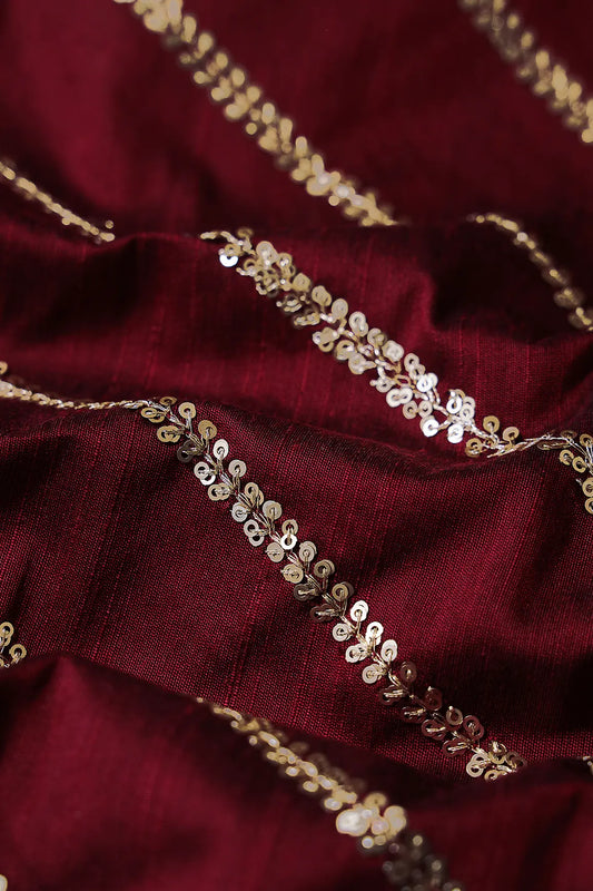 AIzaSyBcstauz-XMPRhEY21AUzeo032pxrXB5Ug - Gold Sequins With Gold Zari Stripes Embroidery Work On Dark Maroon Raw Silk Fabric