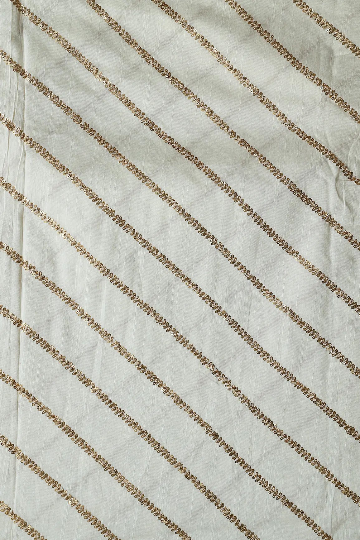 AIzaSyBcstauz-XMPRhEY21AUzeo032pxrXB5Ug - Gold Sequins With Gold Zari Stripes Embroidery Work On White Raw Silk Fabric