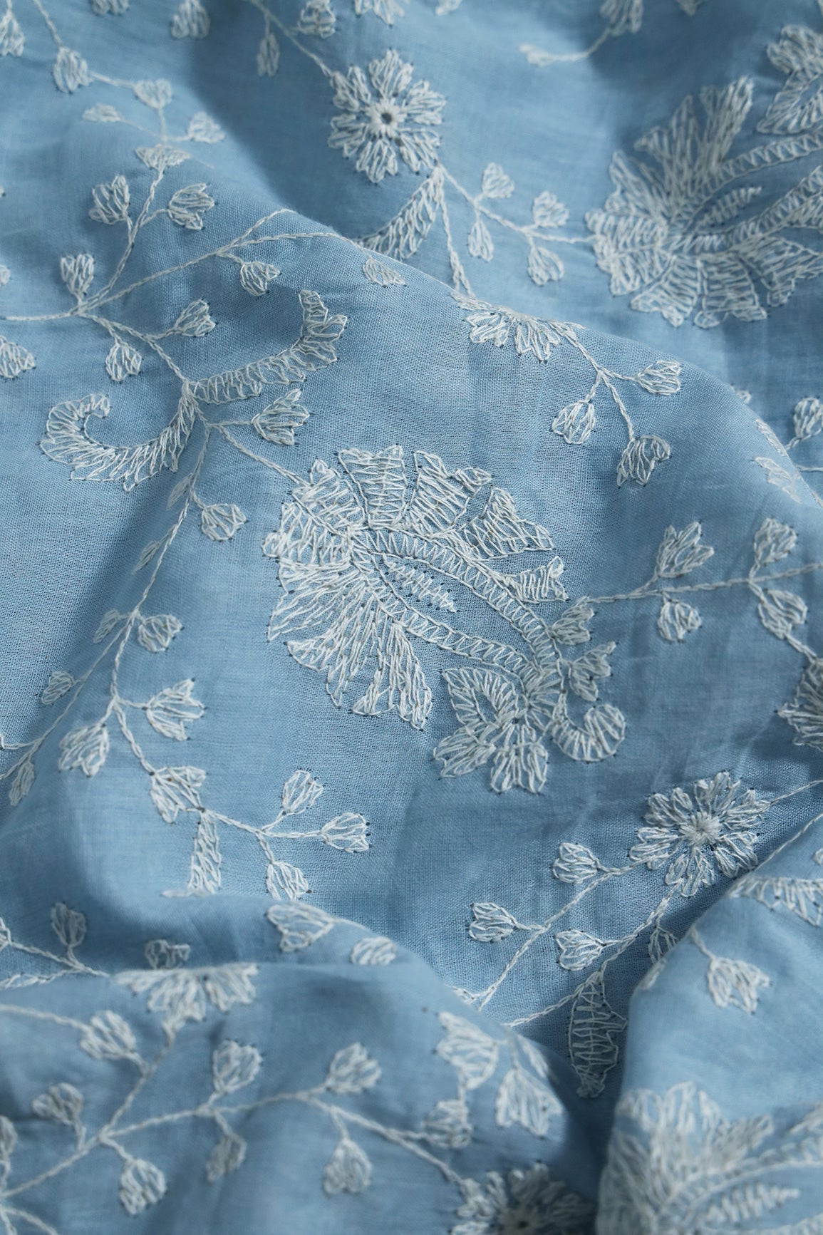 AIzaSyBcstauz-XMPRhEY21AUzeo032pxrXB5Ug - Beautiful White Thread Floral Paisley Embroidery On Blue Pure Mul Cotton Fabric