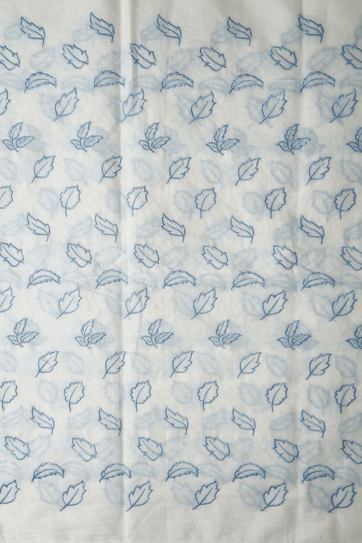 AIzaSyBcstauz-XMPRhEY21AUzeo032pxrXB5Ug - Beautiful Blue Leafy Embroidery On Off White Organic Cotton Fabric