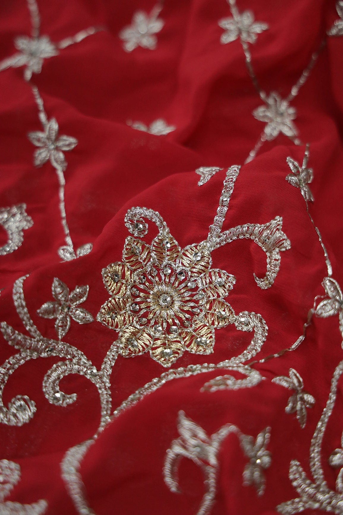 AIzaSyBcstauz-XMPRhEY21AUzeo032pxrXB5Ug - Big Width''56'' Gold And Silver Zari Floral Embroidery Work On Red Georgette Fabric With Border