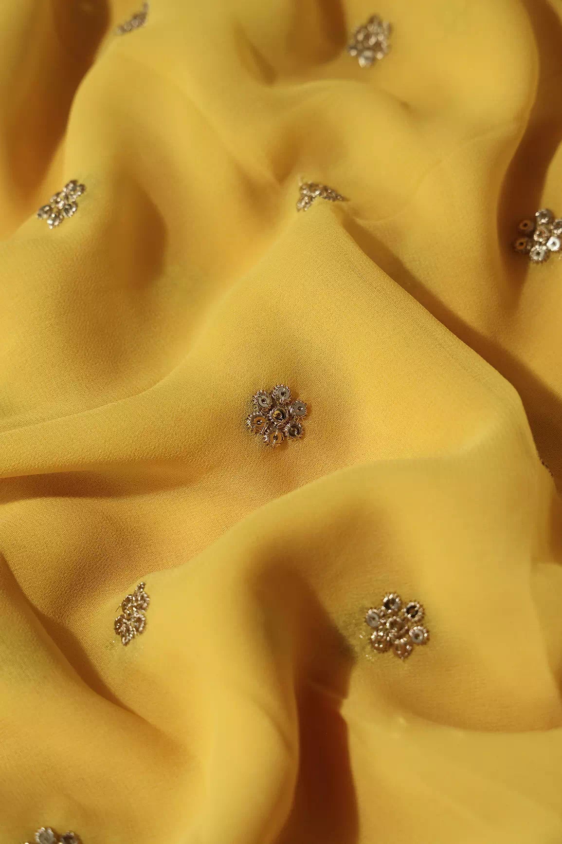 AIzaSyBcstauz-XMPRhEY21AUzeo032pxrXB5Ug - Gold Sequins With Gold Zari Small Motif Embroidery Work On Yellow Viscose Georgette Fabric
