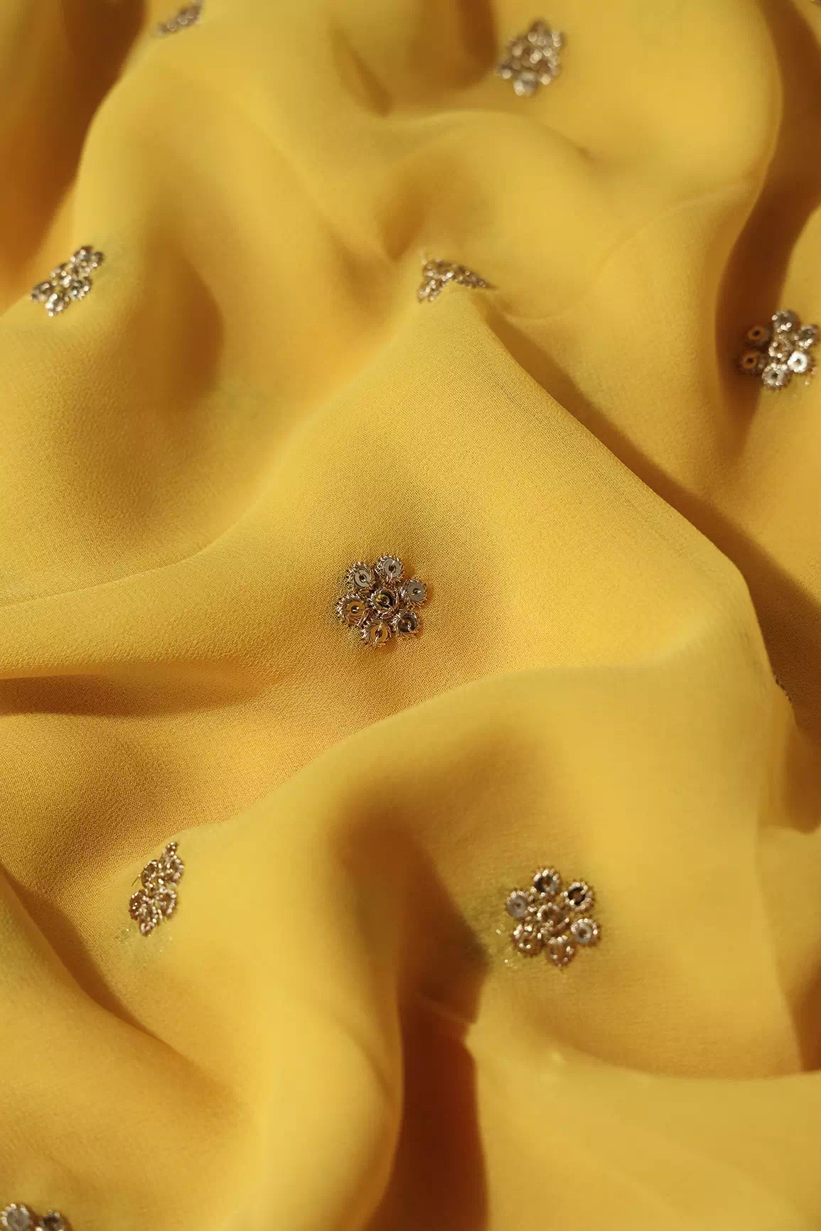 AIzaSyBcstauz-XMPRhEY21AUzeo032pxrXB5Ug - Gold Sequins With Gold Zari Small Motif Embroidery Work On Yellow Viscose Georgette Fabric