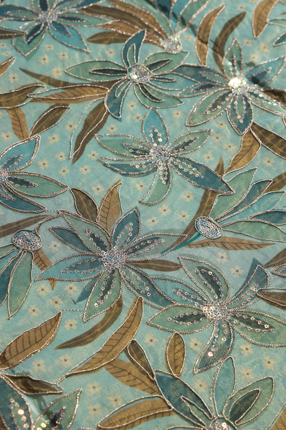 AIzaSyBcstauz-XMPRhEY21AUzeo032pxrXB5Ug - Floral Position Print On Sequins With Zari Embroidery On Pastel Olive Viscose Zari Tissue Fabric