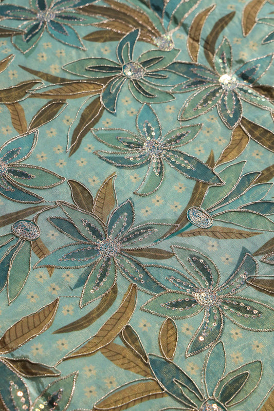 AIzaSyBcstauz-XMPRhEY21AUzeo032pxrXB5Ug - Floral Position Print On Sequins With Zari Embroidery On Pastel Olive Viscose Zari Tissue Fabric