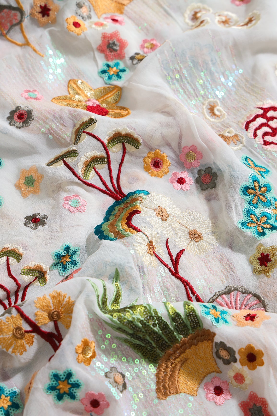 AIzaSyBcstauz-XMPRhEY21AUzeo032pxrXB5Ug - Big Width "52" Multi Sequins With Multi Thread Traditional Embroidery On Dyeable White Viscose Georgette Fabric