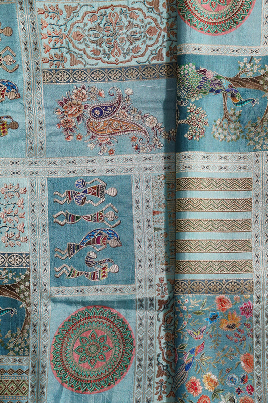 Positional Floral Print On Pastel Blue Viscose Dola Silk Jacquard Fabric