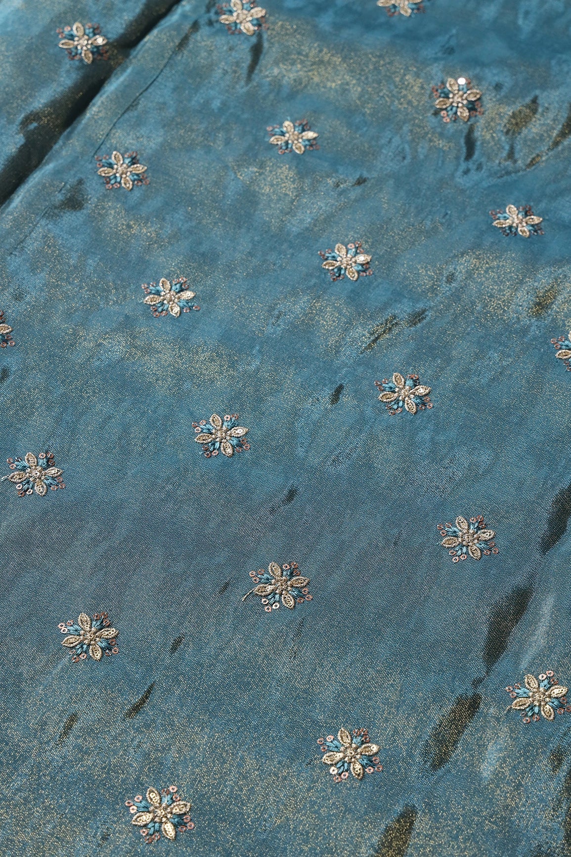 AIzaSyBcstauz-XMPRhEY21AUzeo032pxrXB5Ug - Gold Sequins And Zari Floral Booti Embroidery Work On Turkish Blue Pure Viscose Zari Tissue Fabric