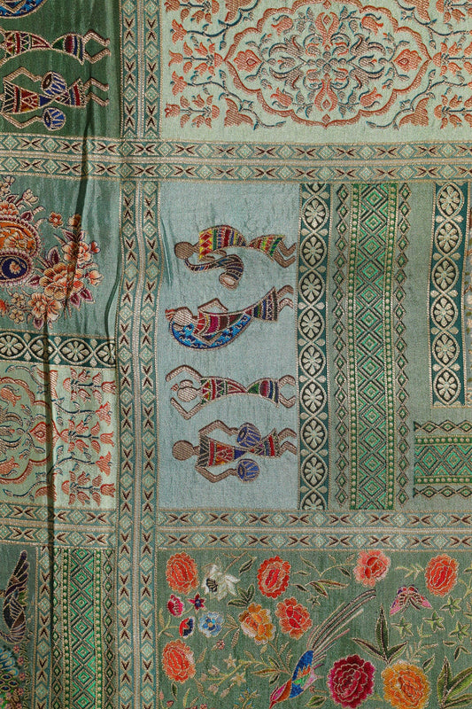 Positional Floral Print On Pastel Olive Viscose Dola Silk Jacquard Fabric