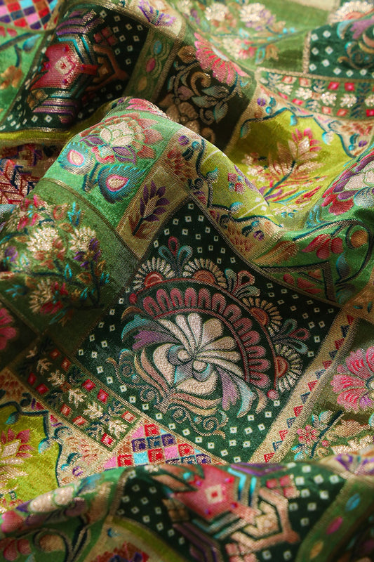 Positional Floral Print On Pastel Green Viscose Dola Silk Jacquard Fabric