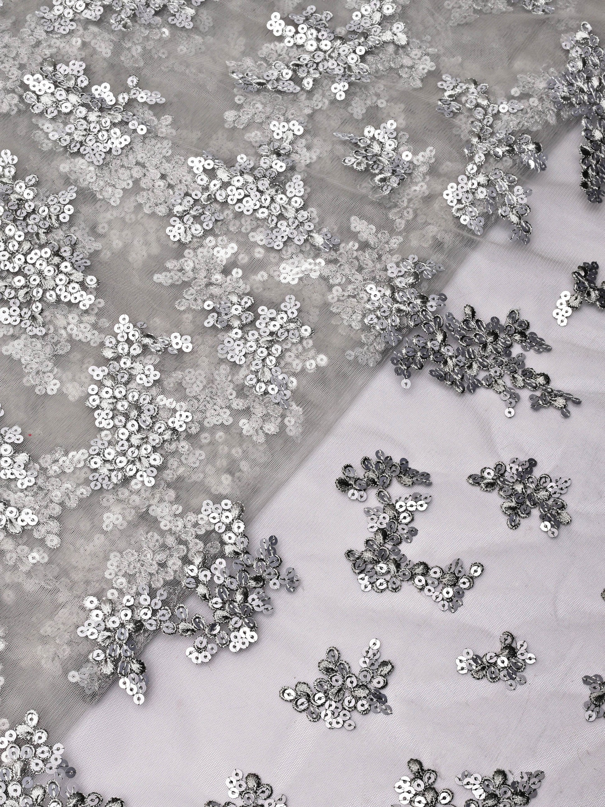 AIzaSyBcstauz-XMPRhEY21AUzeo032pxrXB5Ug - Exclusive Grey Thread With Sequins Abstract Embroidery Work On Grey Soft Net Fabric