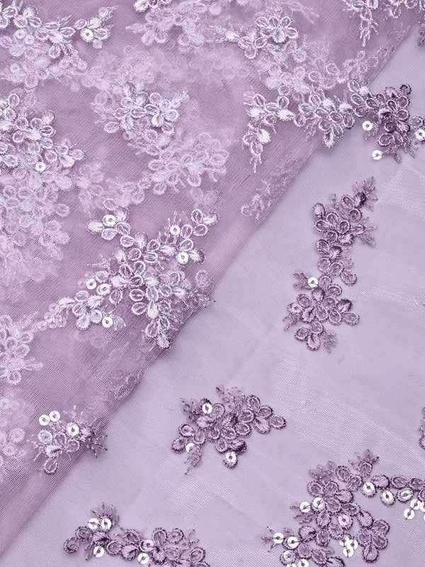AIzaSyBcstauz-XMPRhEY21AUzeo032pxrXB5Ug - Exclusive Lilac Thread With Sequins Abstract Embroidery Work On Lilac Soft Net Fabric