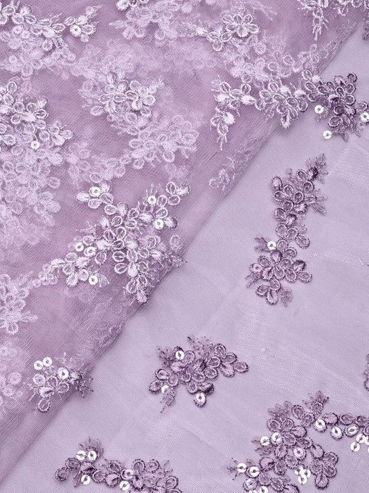 AIzaSyBcstauz-XMPRhEY21AUzeo032pxrXB5Ug - Exclusive Lilac Thread With Sequins Abstract Embroidery Work On Lilac Soft Net Fabric