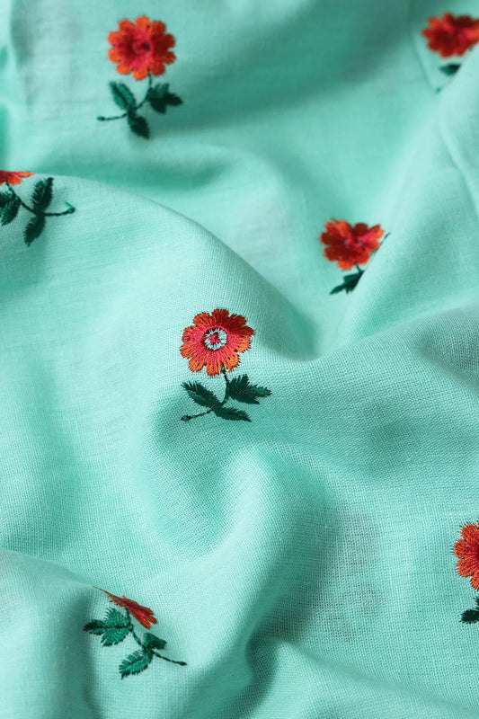 AIzaSyBcstauz-XMPRhEY21AUzeo032pxrXB5Ug - Beautiful Dark Orange And Green Floral Embroidery Work On Sea Green Pure Cotton Fabric