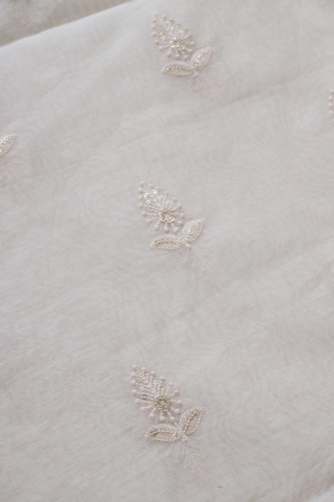 AIzaSyBcstauz-XMPRhEY21AUzeo032pxrXB5Ug - Beautiful Gold Sequins With Leafy Embroidery On Cream Pure Chanderi Silk Fabric