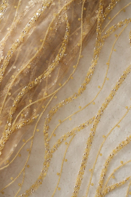 AIzaSyBcstauz-XMPRhEY21AUzeo032pxrXB5Ug - Beautiful Sequins With Beige Thread Wavy Embroidery Work On Beige Soft Net Fabric
