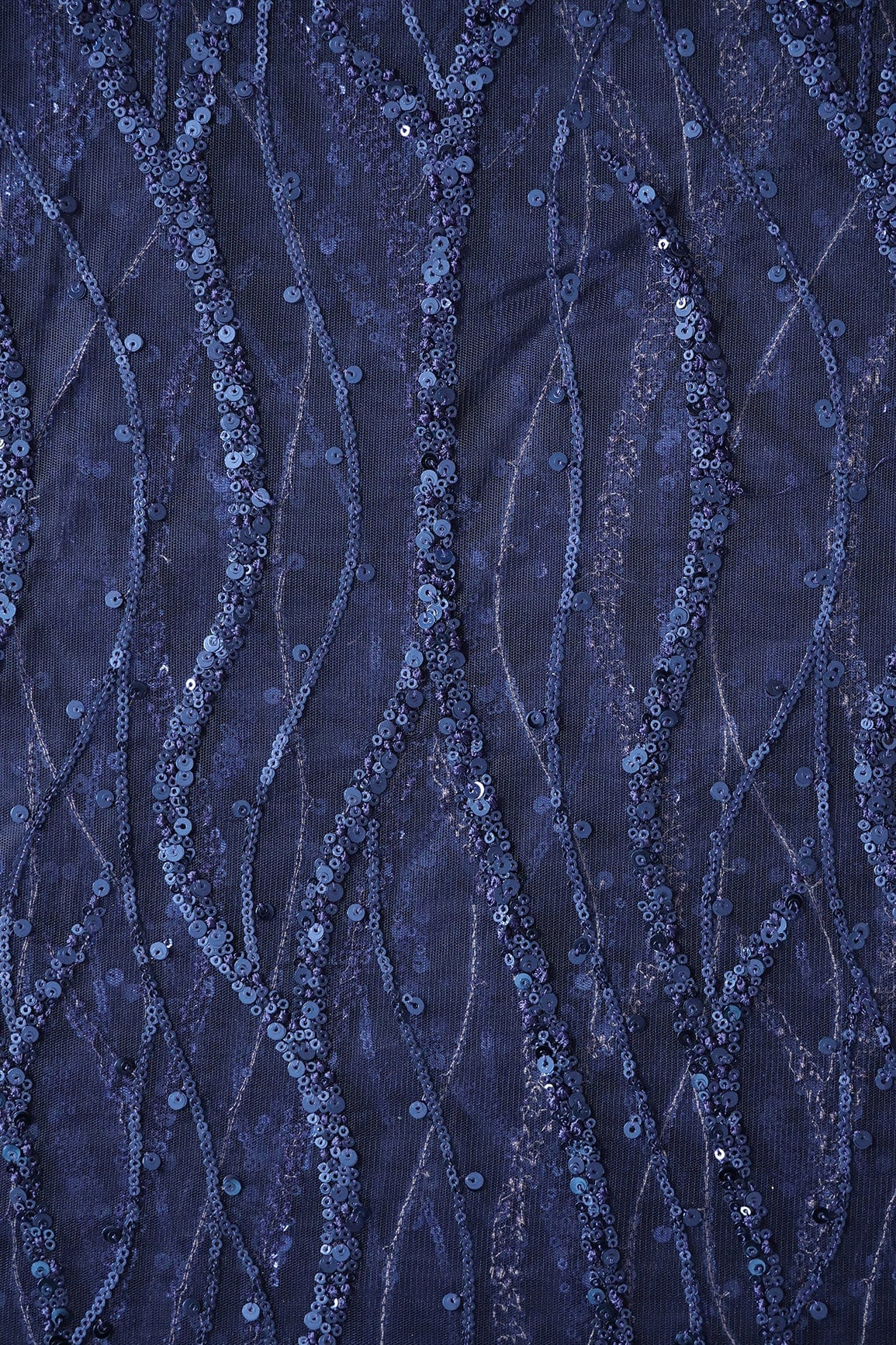 AIzaSyBcstauz-XMPRhEY21AUzeo032pxrXB5Ug - Beautiful Sequins With Blue Thread Wavy Embroidery Work On Navy Blue Soft Net Fabric