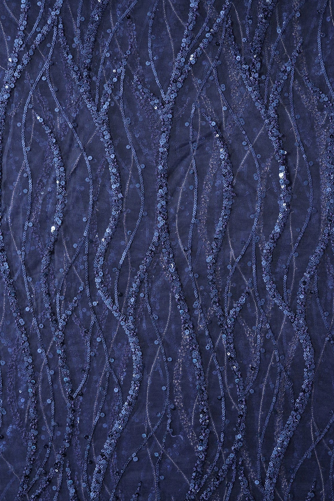 AIzaSyBcstauz-XMPRhEY21AUzeo032pxrXB5Ug - Beautiful Sequins With Blue Thread Wavy Embroidery Work On Navy Blue Soft Net Fabric