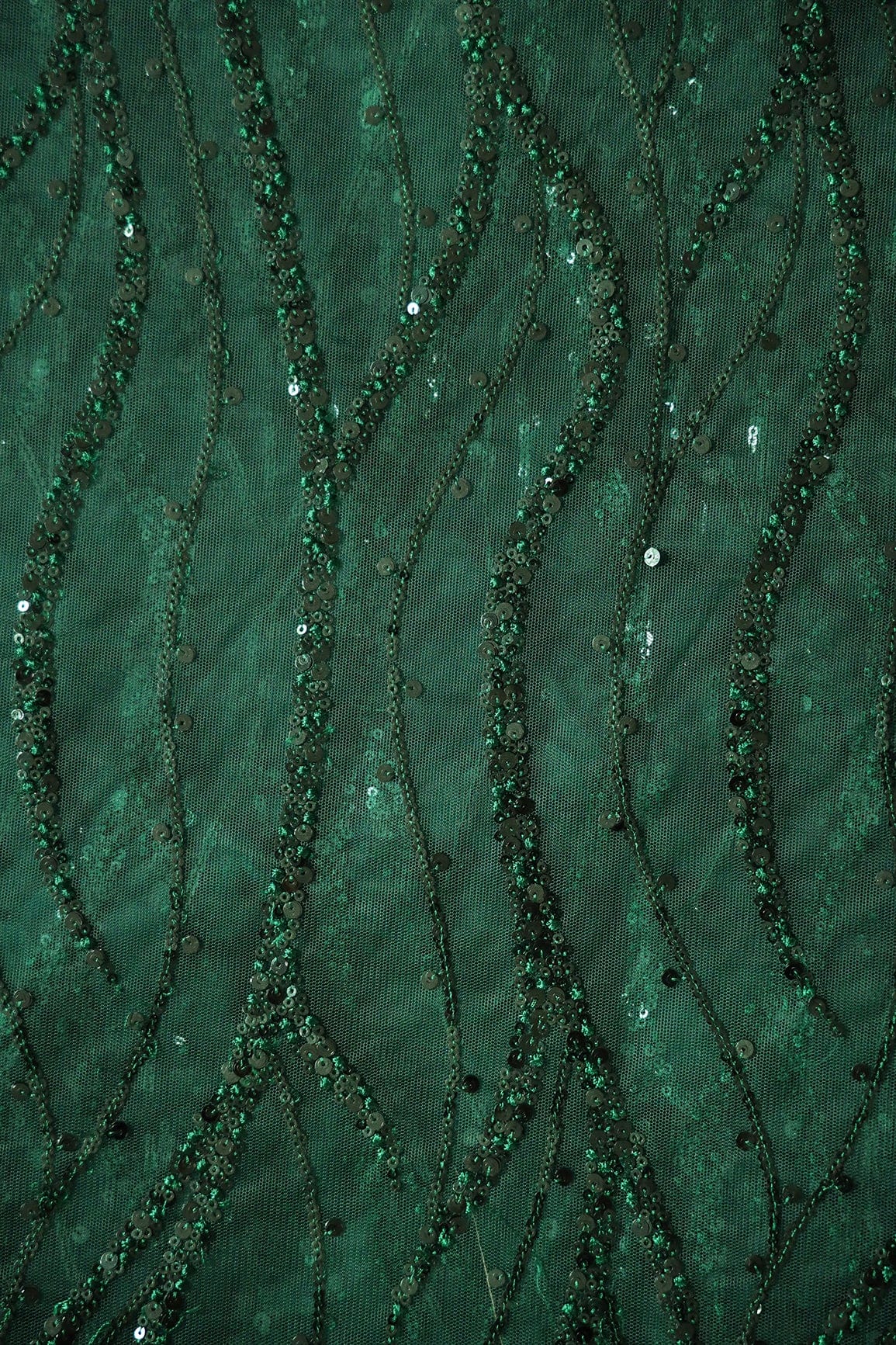 AIzaSyBcstauz-XMPRhEY21AUzeo032pxrXB5Ug - Beautiful Sequins With Green Thread Wavy Embroidery Work On Bottle Green Soft Net Fabric