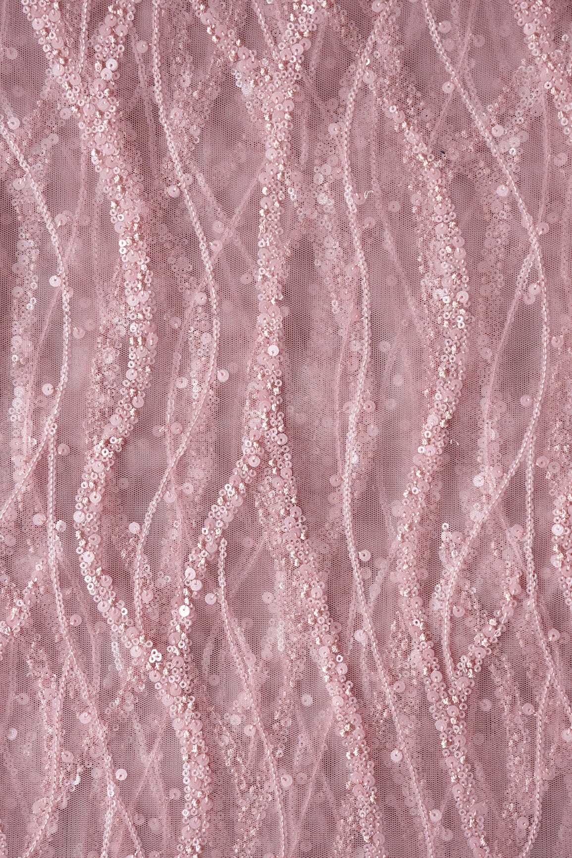 AIzaSyBcstauz-XMPRhEY21AUzeo032pxrXB5Ug - Beautiful Sequins With Mauve Thread Wavy Embroidery Work On Mauve Soft Net Fabric