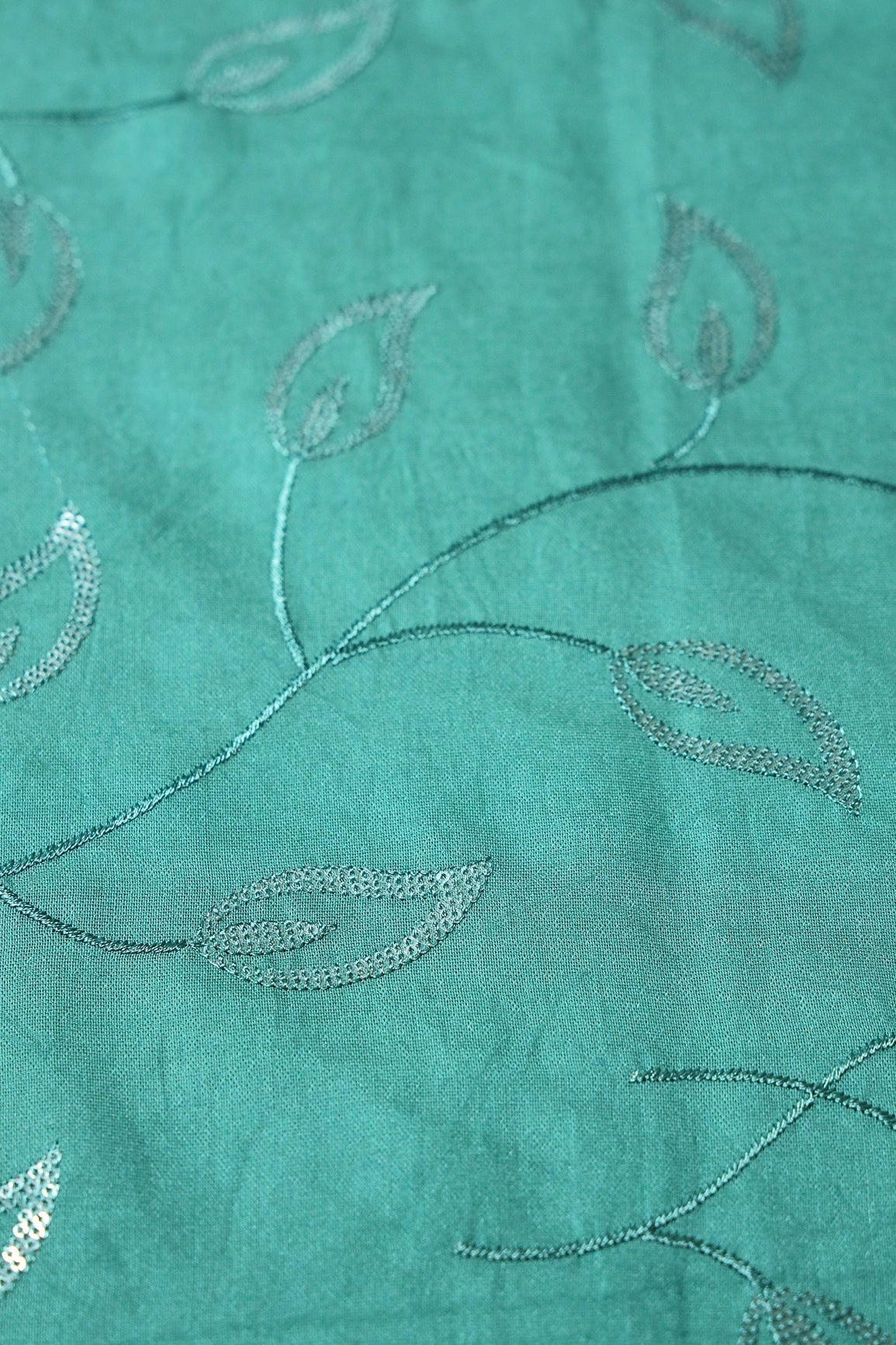 AIzaSyBcstauz-XMPRhEY21AUzeo032pxrXB5Ug - Beautiful Water Sequins Leafy Embroidery On Teal Pure Chanderi Silk Fabric