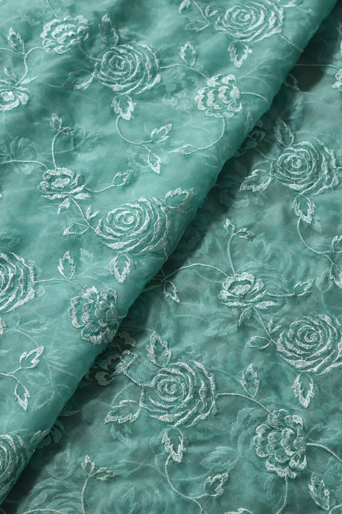 AIzaSyBcstauz-XMPRhEY21AUzeo032pxrXB5Ug - Beautiful Water Sequins With Thread Floral Embroidery On Teal Organza Fabric
