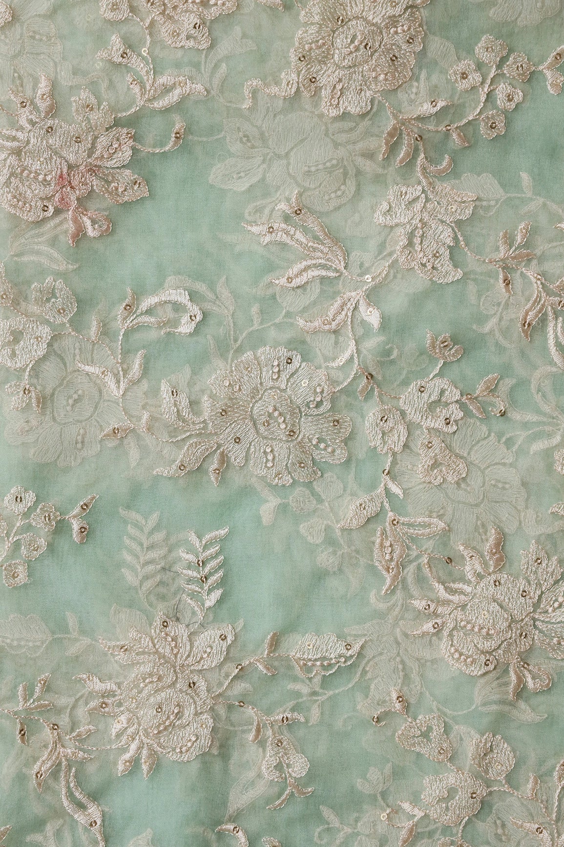 AIzaSyBcstauz-XMPRhEY21AUzeo032pxrXB5Ug - Beautiful White Thread With Sequins Floral Embroidery Work On Pista Green Organza Fabric