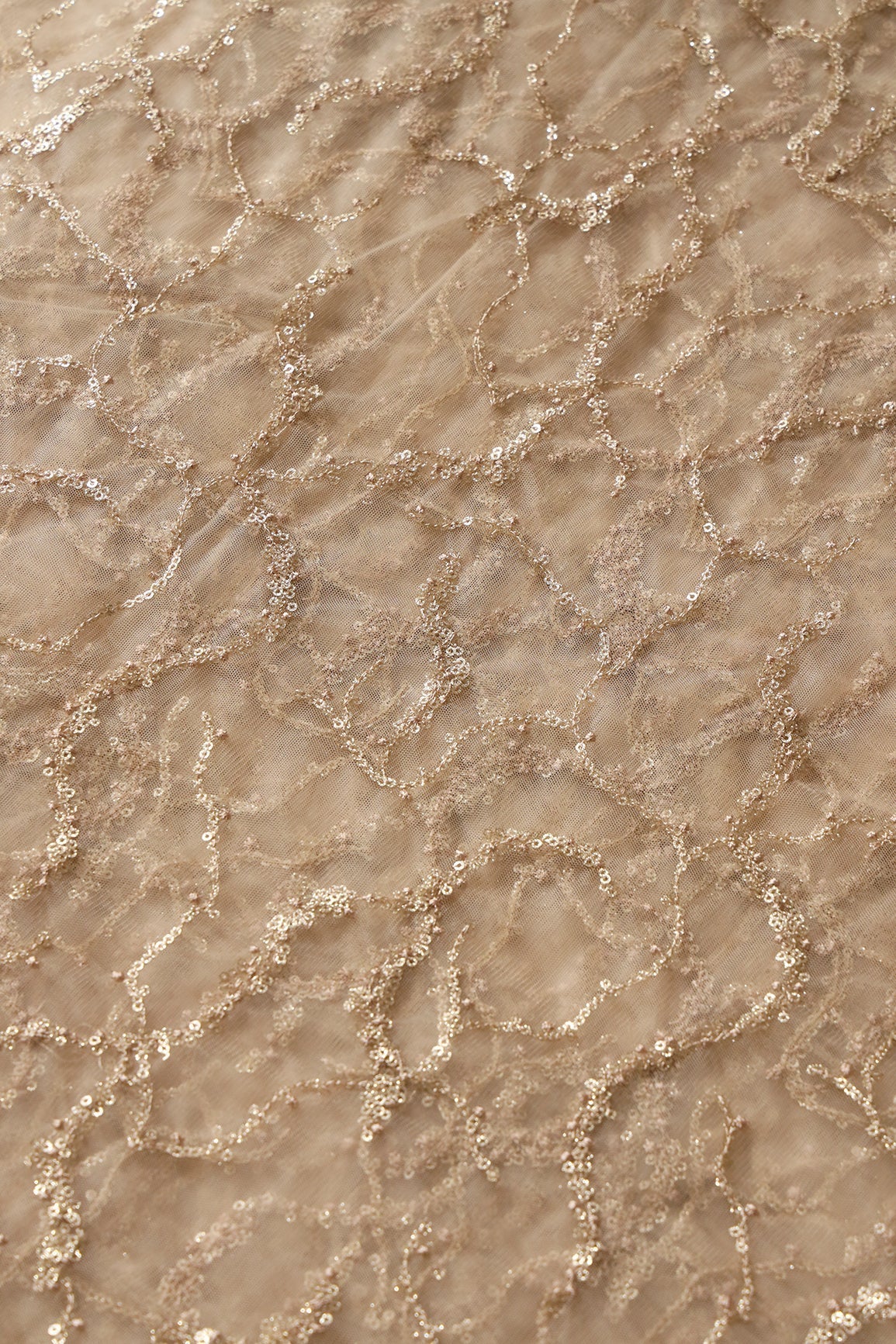 AIzaSyBcstauz-XMPRhEY21AUzeo032pxrXB5Ug - Beige Thread With Gold Glitter Sequins Abstract Embroidery On Beige Soft Net Fabric