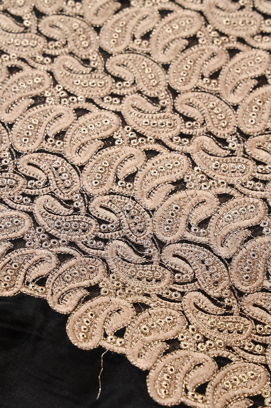 AIzaSyBcstauz-XMPRhEY21AUzeo032pxrXB5Ug - Beige Thread With Gold Zari Heavy Paisley Embroidery On Black Soft Net Fabric
