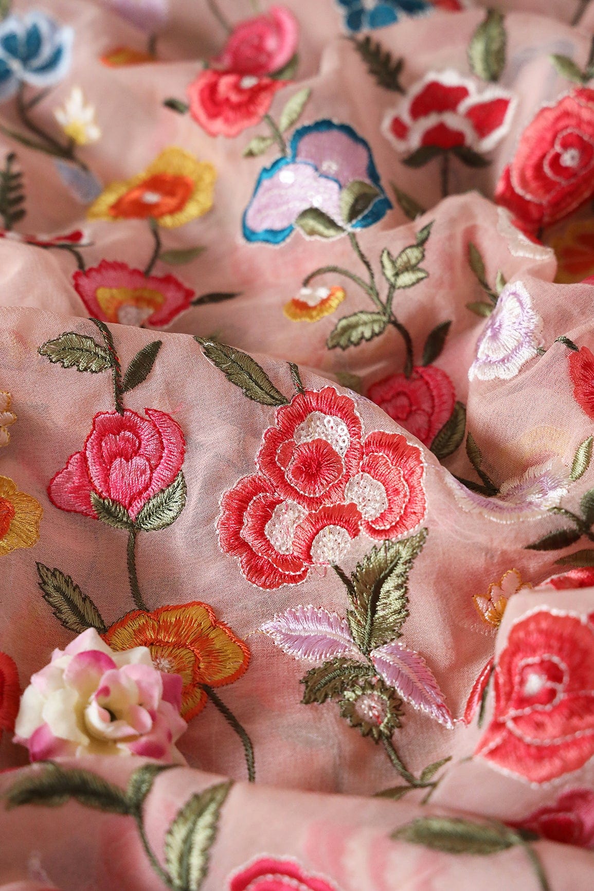 AIzaSyBcstauz-XMPRhEY21AUzeo032pxrXB5Ug - Big Width "56" Multi Thread With Water Sequins Floral Embroidery On Peach Viscose Georgette Fabric