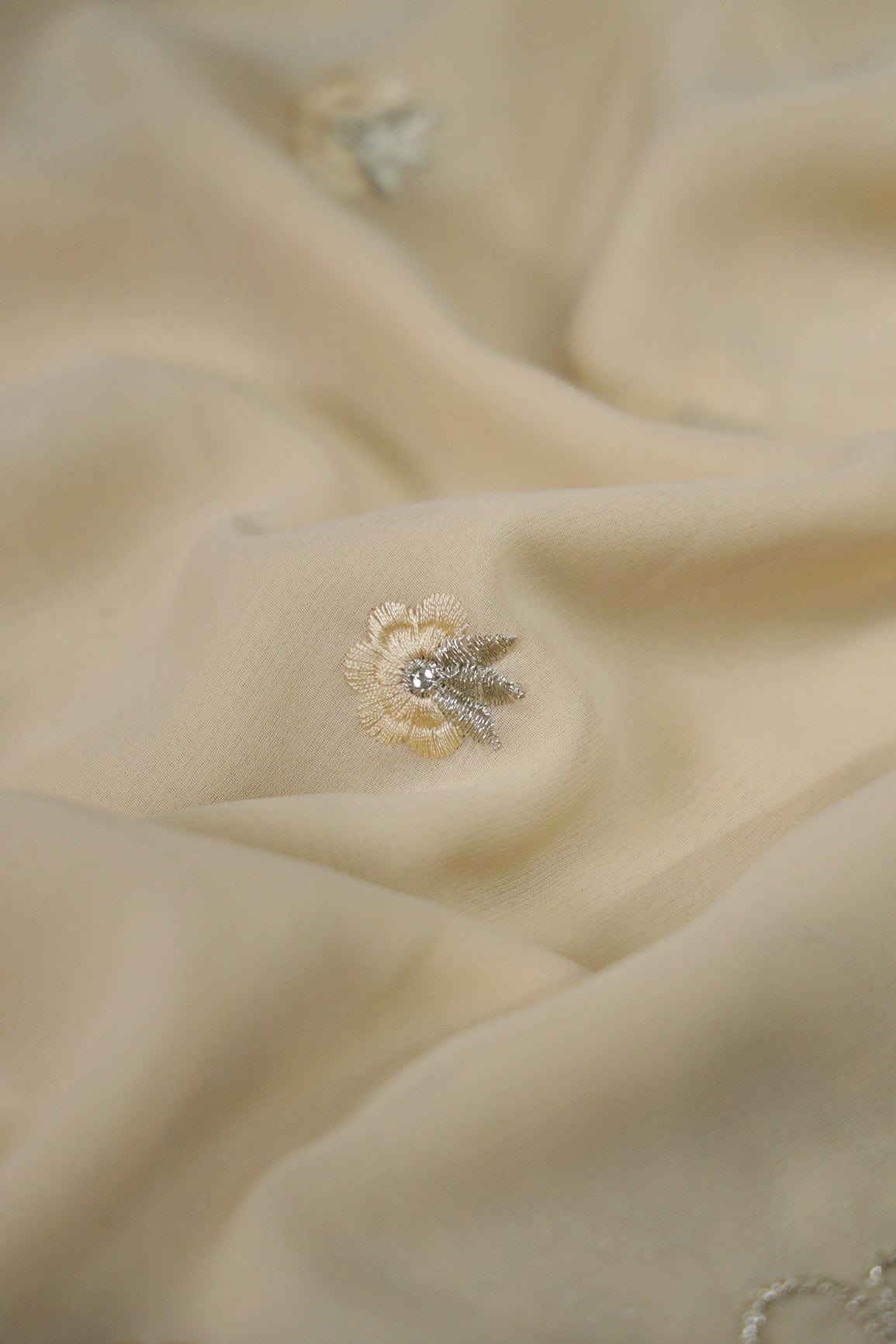 AIzaSyBcstauz-XMPRhEY21AUzeo032pxrXB5Ug - Big Width''56'' Cream Thread With Zari Floral Embroidery Work On Cream Georgette Fabric With Border